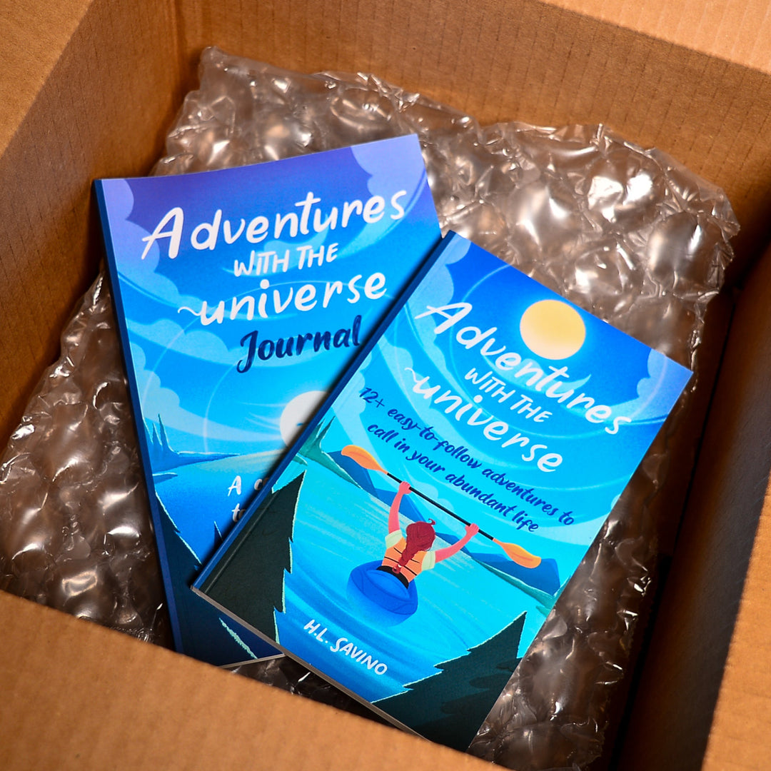 Adventures With The Universe Book and Workbook in a box with bubble wrap