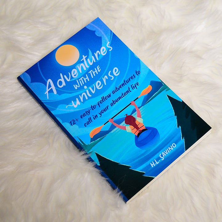 Adventures with the Universe book on white blanket