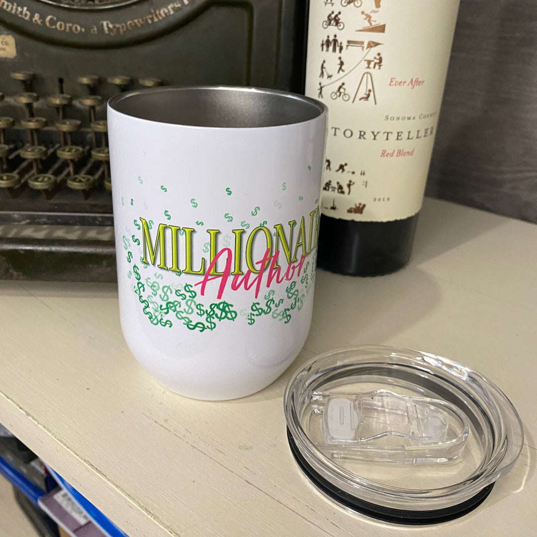 A white insulated stainless steel tumbler with the words &