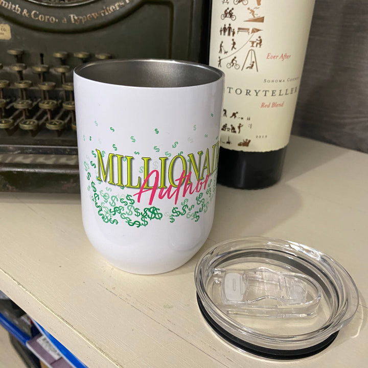 A white insulated stainless steel tumbler with the words &