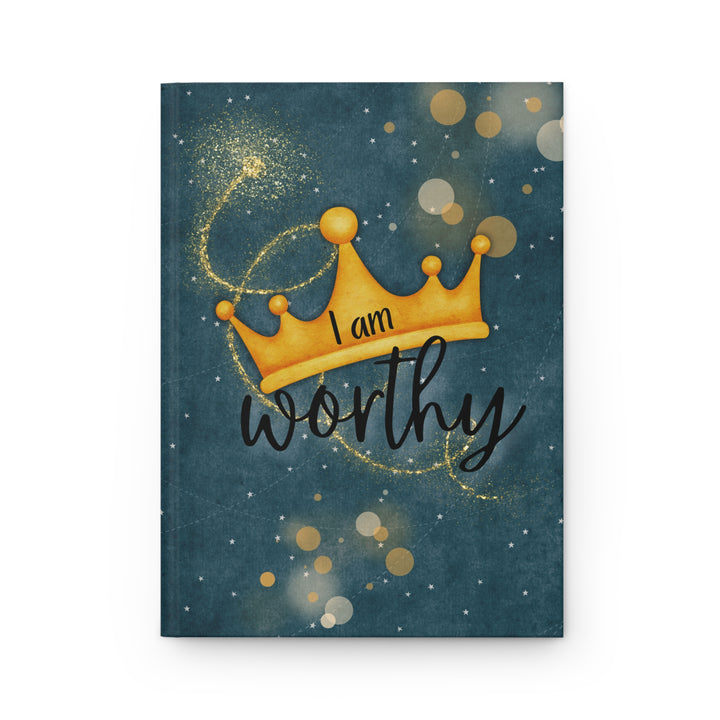 journal cover with dark blue gray cover, silver and gold circles and a gold crown. Says "I am worthy"