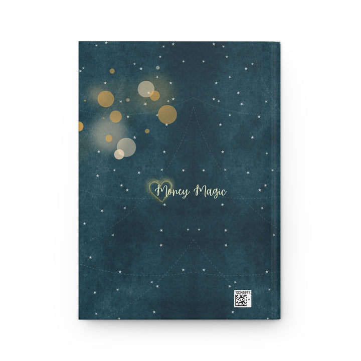 journal back cover with dark blue gray cover, silver and gold circles stars that Says "money magic"
