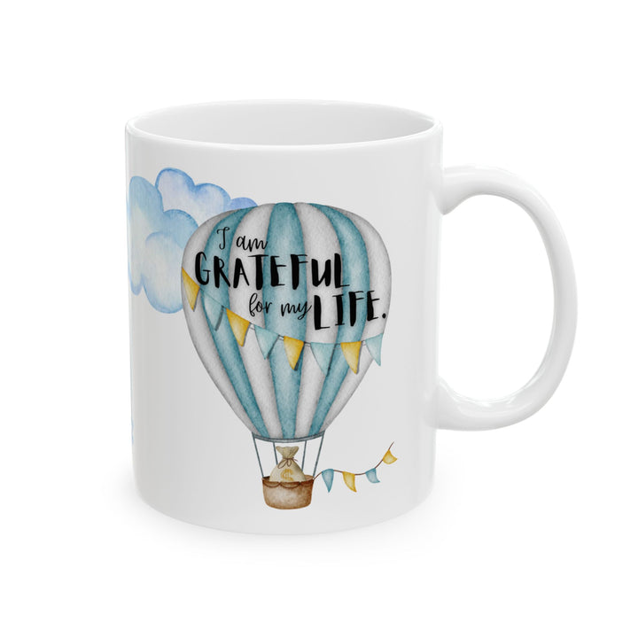 Back of mug showing same balloon and words as front 