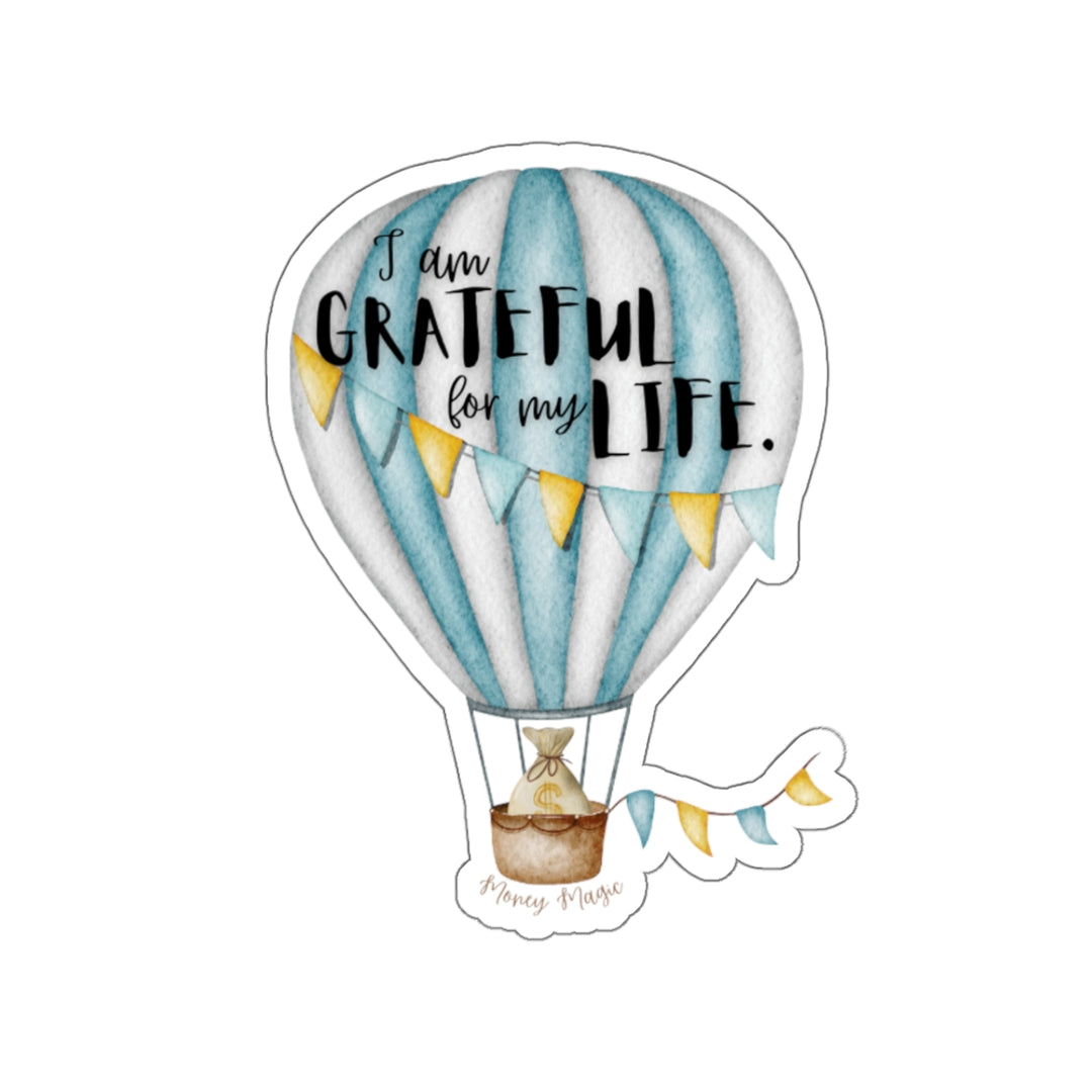 Shows a balloon with money bag in the basket and says "I Am Grateful for my Life"