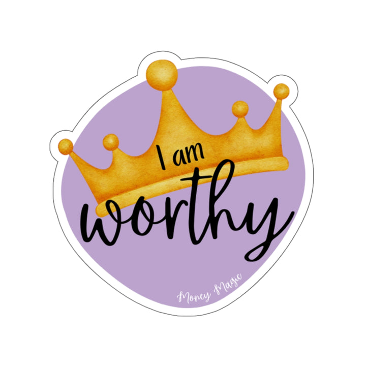 Shows a purple irregular circle with a crown in the middle. Says "I am worthy" and at the bottom "Money magic" smaller. On white background