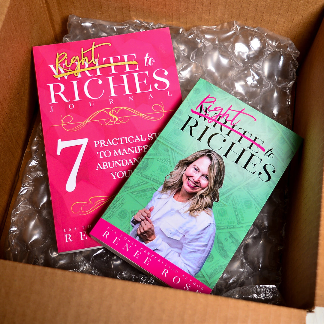 Write To Riches book and workbook in box with bubble wrap
